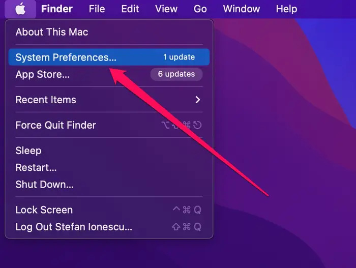 Bạn mở MacBook và chọn vào biểu tượng quả táo, rồi chọn “System Preferences” 